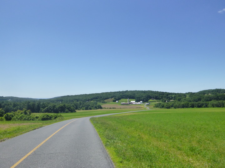 Fun downhill section overlooking farm on Huffs Church Road